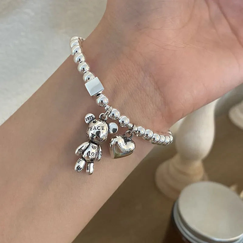 Sterling Silver Round Bead Bracelet: Versatile Charm Jewelry