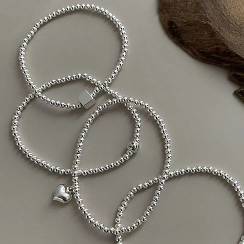 Sterling Silver Round Bead Bracelet: Versatile Charm Jewelry